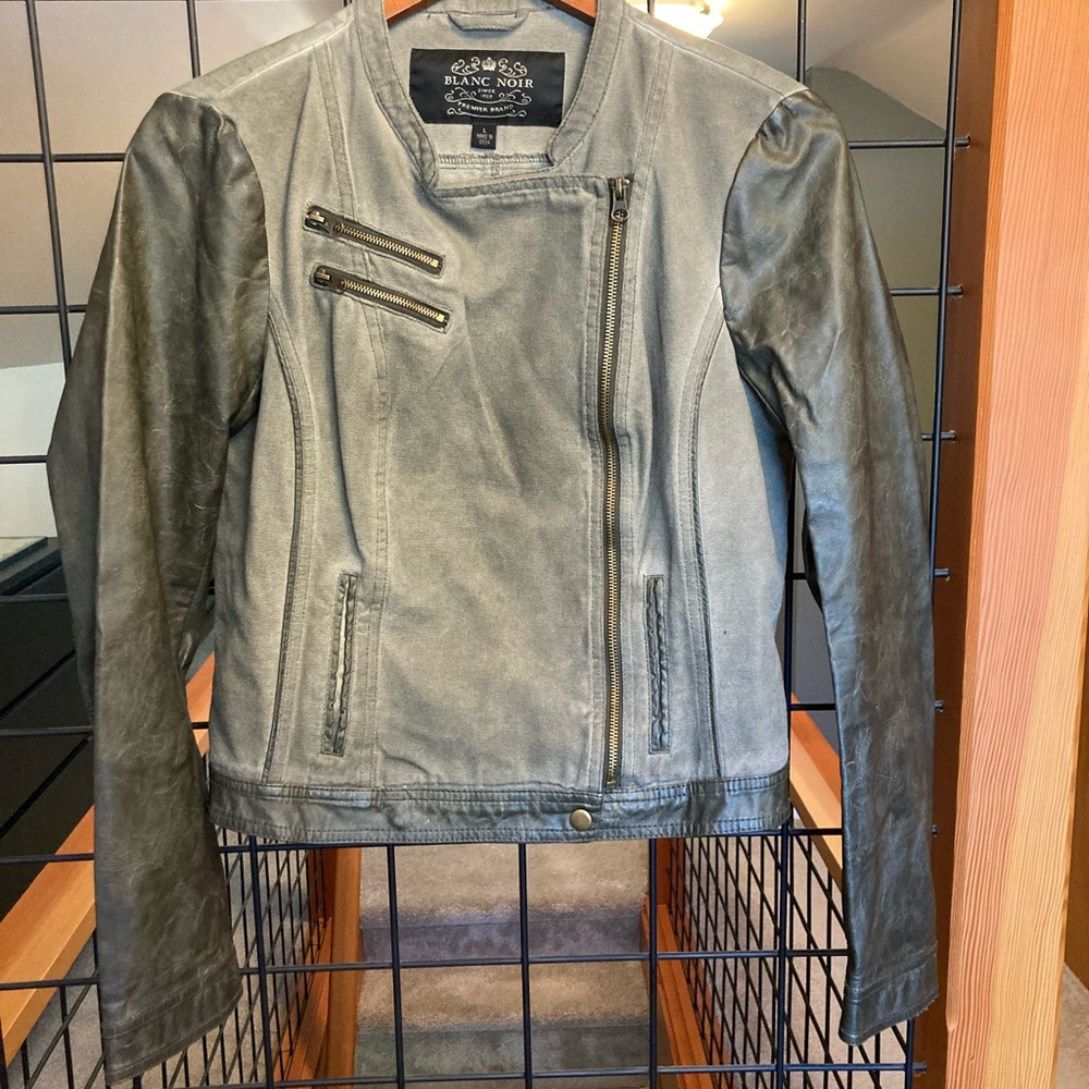 Distressed denim jacket w/ faux leather sleeves. Olive color, size large.